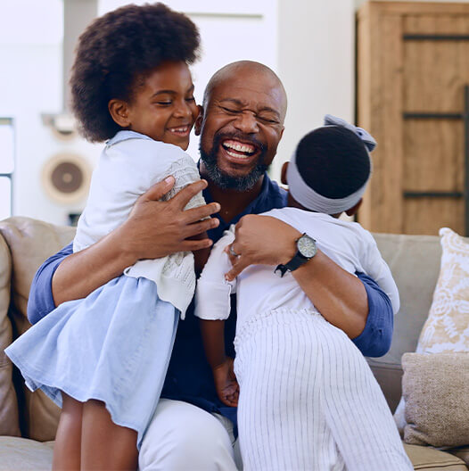 Father laughing with his children